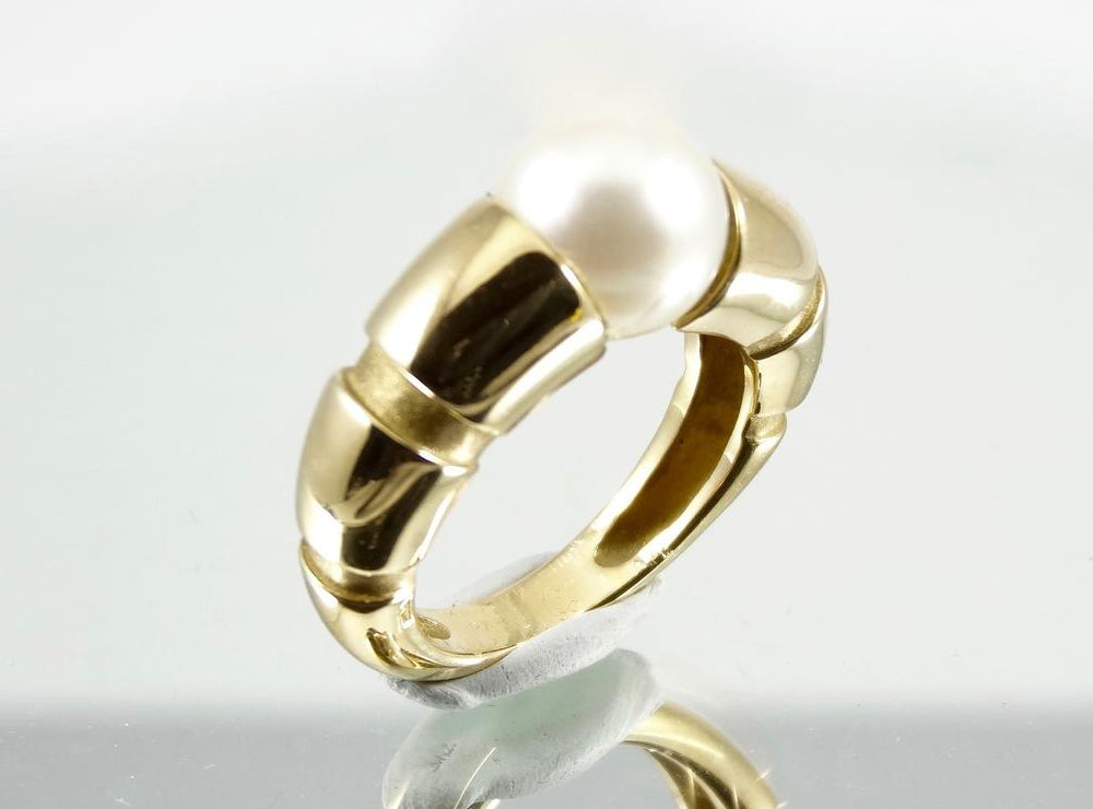 Demi-alliance en or et diamants