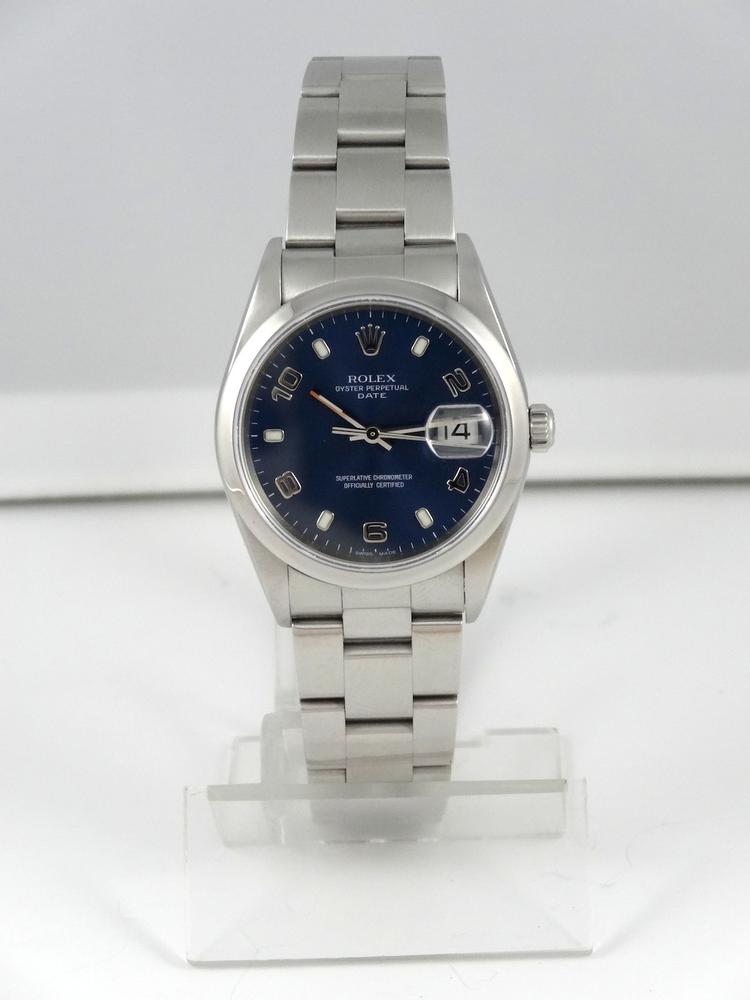 Rolex Date cadran bleu série D avec papiers