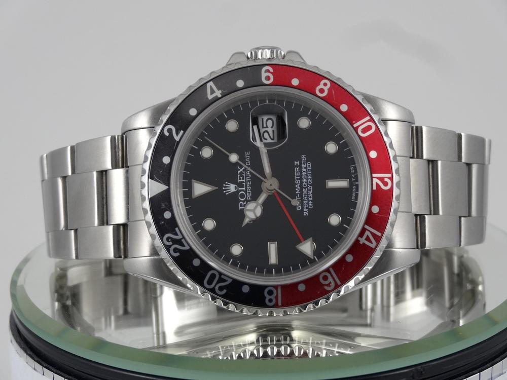 Rolex GMT II Rouge & Noir Full Set avec 2 lunettes