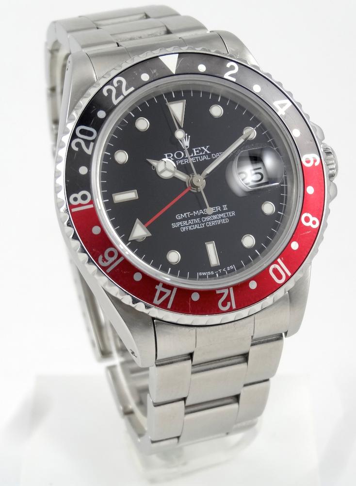 Rolex GMT II Rouge & Noir Full Set avec 2 lunettes