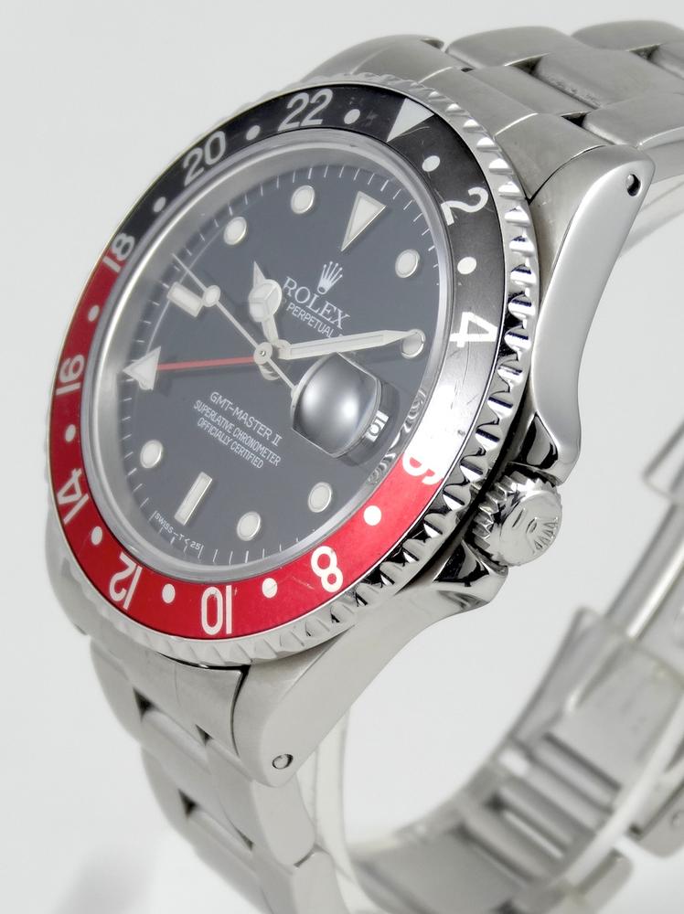 Rolex GMT II Rouge & Noir Full Set avec 2 lunettes