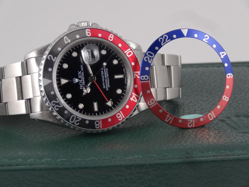 Rolex GMT II Rouge & Noir Full Set avec 2 lunettes