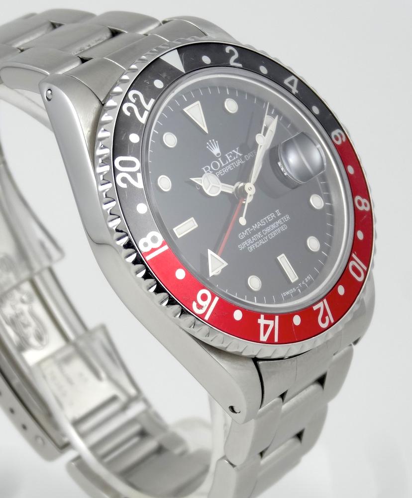 Rolex GMT II Rouge & Noir Full Set avec 2 lunettes