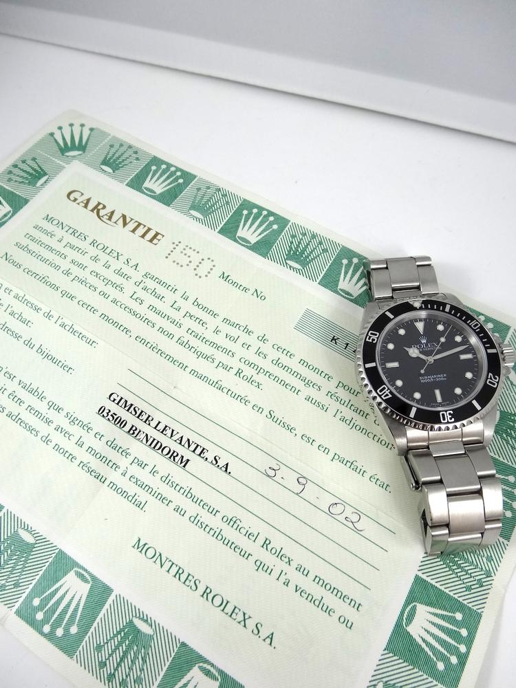 Rolex Submariner Sans Date 14060M année 2002 Boite & Papiers
