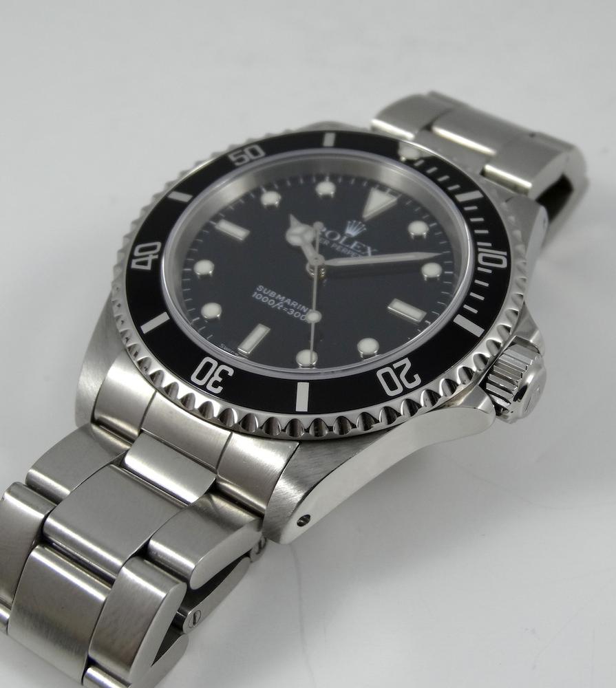 Rolex Submariner Sans Date 14060M année 2002 Boite & Papiers