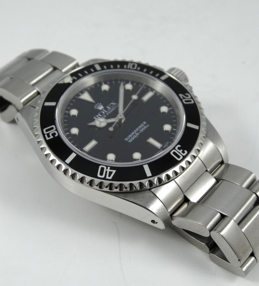 Rolex Submariner Sans Date 14060M année 2002 Boite & Papiers