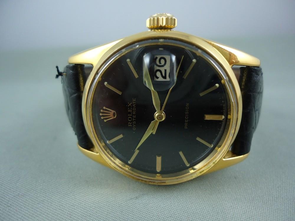 Rolex Date or & acier cadran noir Réf 6694
