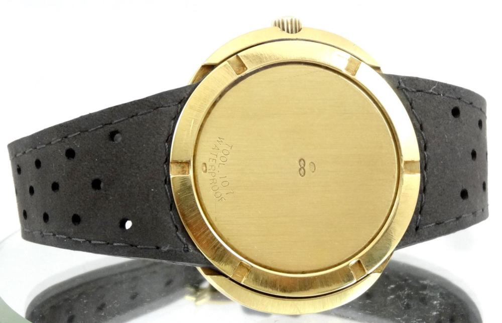 Omega Dynamic Date or jaune cadran Noir Stardust