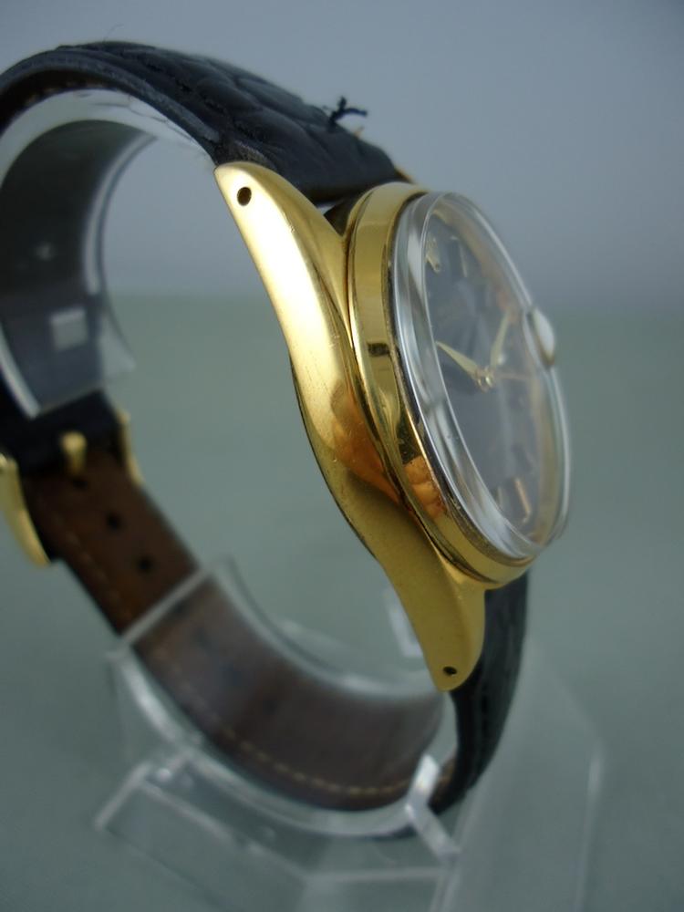 Rolex Date or & acier cadran noir Réf 6694