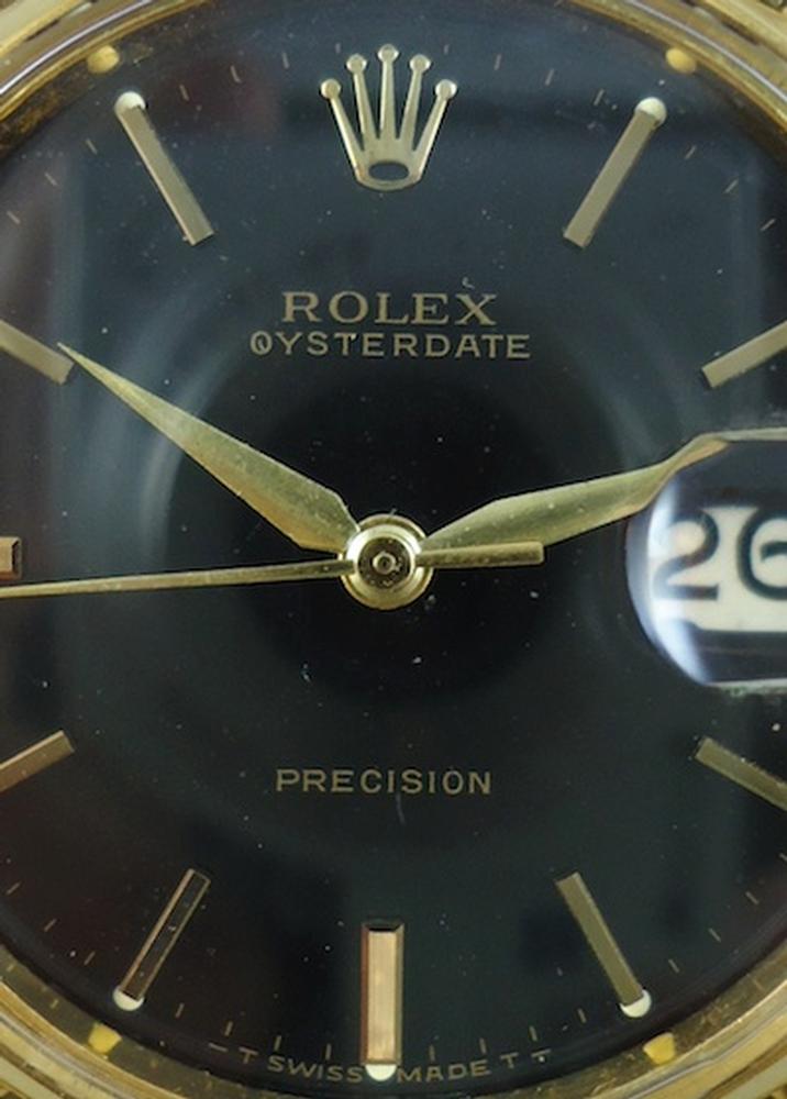 Rolex Date or & acier cadran noir Réf 6694