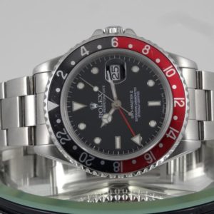 Rolex GMT II Rouge & Noir Full Set avec 2 lunettes