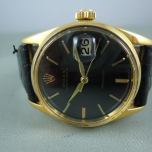 Rolex Date or & acier cadran noir Réf 6694